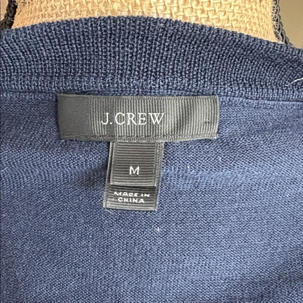 J. Crew 100% merino wool navy blue v-neckline flare sleeve hi lo sweater